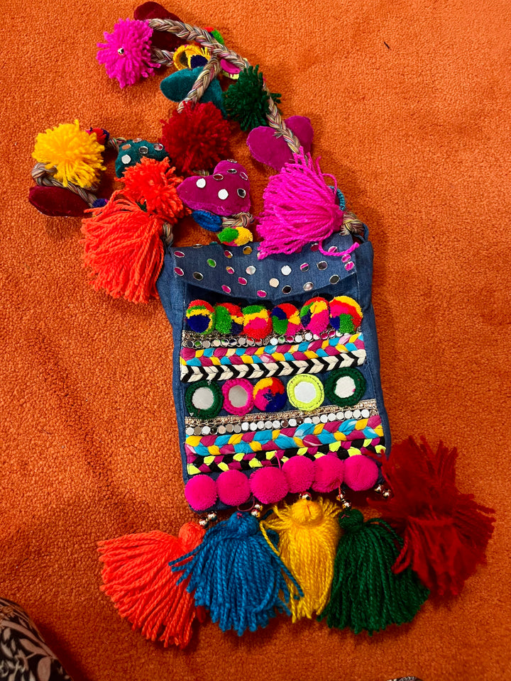 Embroidered Sling Bag with Pom-Pom Strap