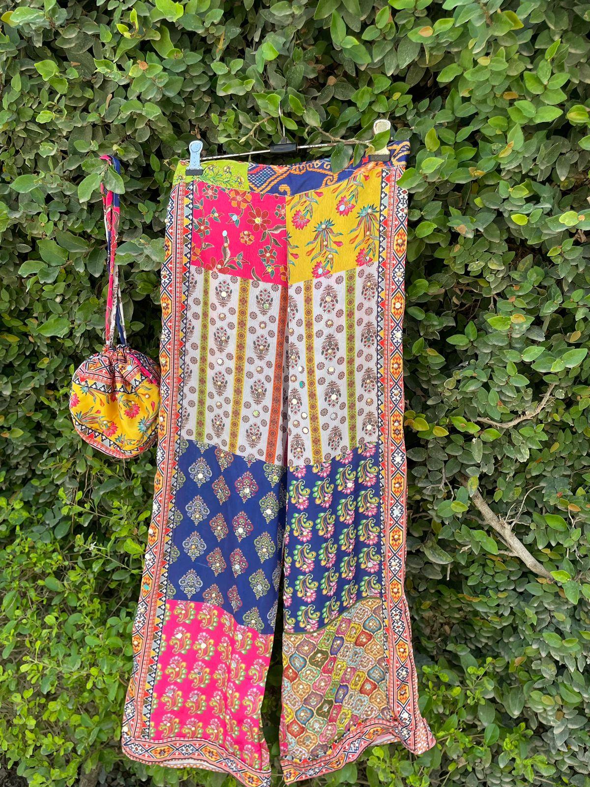 White Dazzle Pants With Matching Potli - banjaratrail